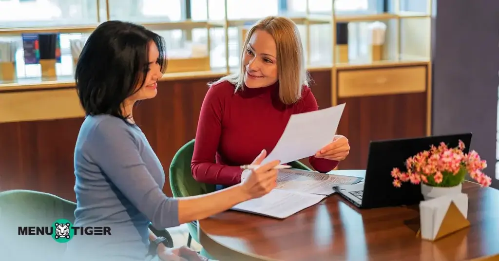 Female business owners talking