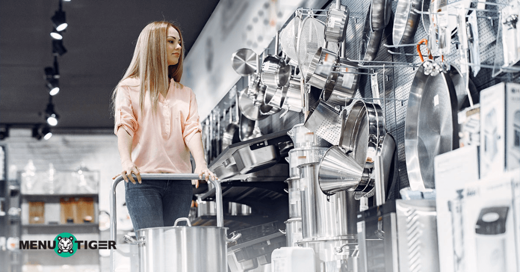 Restaurant owner buying kitchen equipment